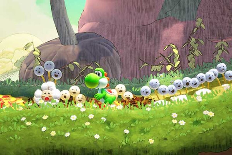 Yoshi läuft auf einer Blumenwiese im Spiel "Yoshi and the Mysterious Book"; Bild: Nintendo Yoshi läuft auf einer Blumenwiese.