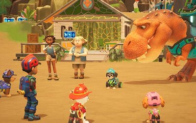 Welpen stehen bei einem Dino im Spiel "PAW Patrol™ Helfer auf vier Pfoten: Dinowelt"; Outright Games Die Welpen stehen einem Dino gegenüber.