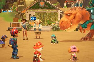 Welpen stehen bei einem Dino im Spiel "PAW Patrol™ Helfer auf vier Pfoten: Dinowelt"; Outright Games Die Welpen stehen einem Dino gegenüber.