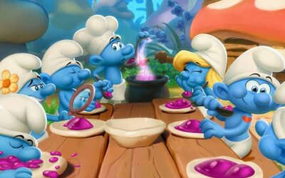 Die Schlümpfe gemeinsam am Esstisch im Spiel "Die Schlümpfe: Abenteuer im Traumland"; Bild: Microids