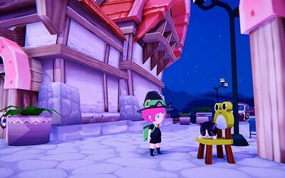 Die Hexe Mika steht neben einer Katze, die auf einem Stuhl liegt.