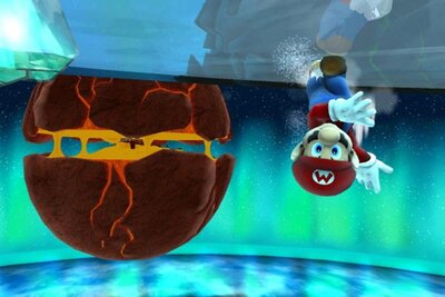 Mario rennt neben einem runden Objekt im Spiel "Super Mario Galaxy & Super Mario Galaxy 2"; Bild: Nintendo