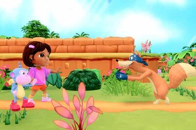 Dora und ihr Affe begegnen einem Fuchs im Spiel "Dora™: Regenwald in Gefahr"; Bild: Outright Games