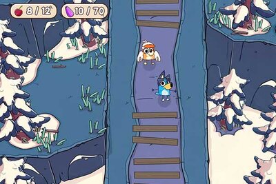 Bluey und Bingo erkunden die Schneelandschaft im Spiel "Bluey's Quest for the Gold Pen"; Bild: PM Studios Bluey und Bingo erkunden die Schneelandschaft im Spiel "Bluey's Quest for the Gold Pen"; Bild: PM Studios