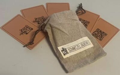 Beutel mit Karten zum Spiel "Schnitzeljägerei; Bild: valocity GmbH